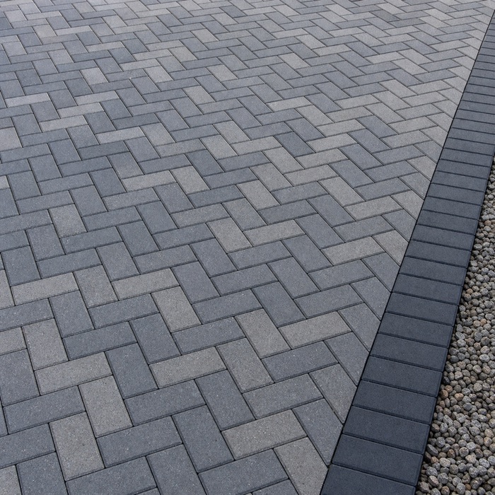 Close-up of grey block-paved driveway